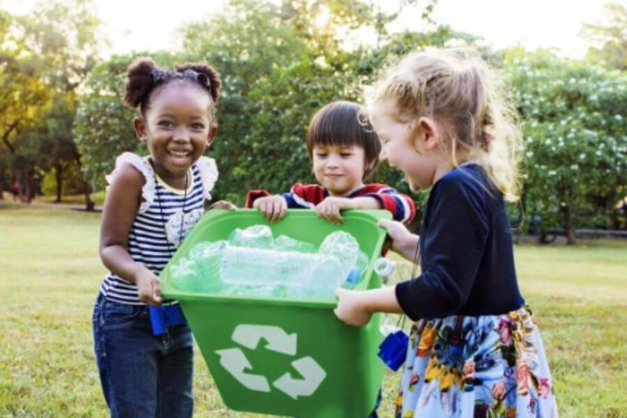 kids with recycling bin