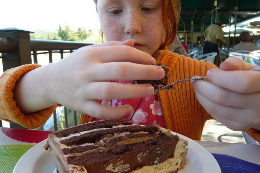 Young girl making cake