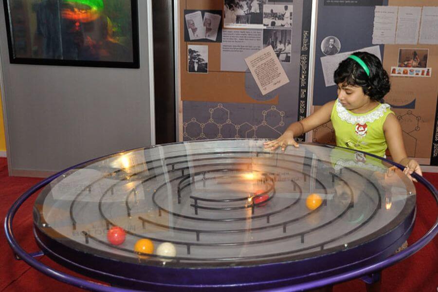 little girl at the science museum